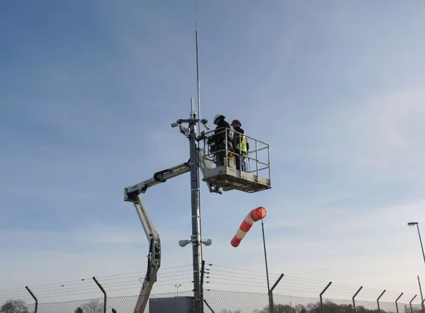 Work on a surveillance camera at a cavern site